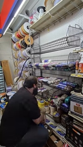 Retailer2Retailer: The Hardware Store Is the Star 3 Ben putting up display Retailer2Retailer: The Hardware Store Is the Star