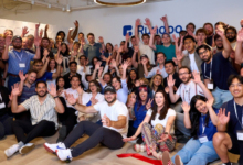 team celebrate 1 AI-First Platform Rundoo Announces $48 Million in Financing